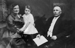 William and Elizabeth Le Ruez with one of their grandchildren