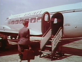 A hostess about to board a Heron