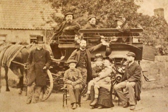 This vehicle photographed by Ernest Baudoux in the 1870s is described as a caleche, being used for a family outing