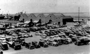 Cars parked on an area created by infilling the top of the Old Harbour in the 1930s