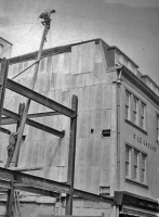 Builders working on an extension to the Bath Street store