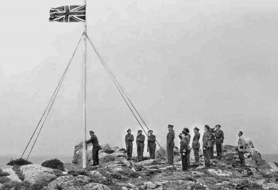 The Union Flag raised on Les Minquiers shortly after the Liberation
