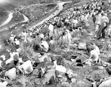 Crowds line the slopes of Bouley Bay to watch the 1951 hill climb
