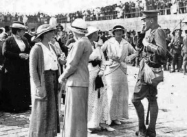 Dignitaries await a departure of men for the front on the Albert Pier