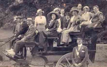 A horse-drawn charabanc in the 19th century