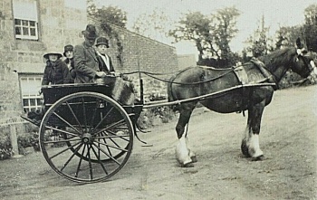 A family carriage outing in about 1920