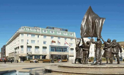 The hotel today, with Liberation Square in front