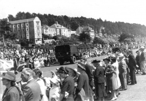 Crowds watch the Empire Day parade on 24 May 1945