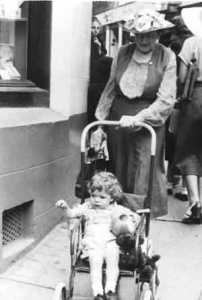Mike Bisson being pushed in his pram by grandmother Constance Rimington