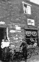 ... Bessie Curwood, born in Jersey in 1869, the first of six children of Alfred and Susan, nee Watts. Bessie went with her family to Bridgewater, Somerset, where she later opened a shop in Albert Street. She is pictured with her son Bert, with his bicycle