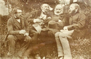 Victor Hugo (second right) and three visitors. Although this photograph is said to have been taken in Jersey, Hugo appears somewhat older than in other photographs taken during his stay in the island
