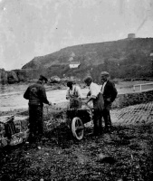 Mending fishing nets at Anne Port in 1911