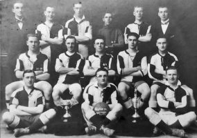Magpies FC 1925-26. Back row: E Hall (secretary), W Cummings, M Ryan, C Mason, I Martin, E de Ste Croix (treasurer); Middle: A Martin, F Bourke, B Perree, P Bassett, S E Ahearn; Front: A Honeycombe, S Ahearn, C Beuzeval