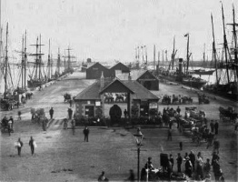Sailing ships line both sides of the New North Quay