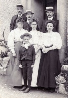 A family dressed in their Sunday best for a 1910 portrait
