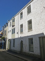 This is a street of car parks, nondescript commercial buildings, and back doors. The only building of any merit is this property, half residential and half commercial. I think it is what in Brett's time was occupied by St Helier Galleries. He noted that, despite reservations about what had been done to the downstairs arch, 'if sympathetically tidied up and freshly painted, this could be outstandingly attractive'. I think he was right. It's one of the hidden gems of central St Helier ...