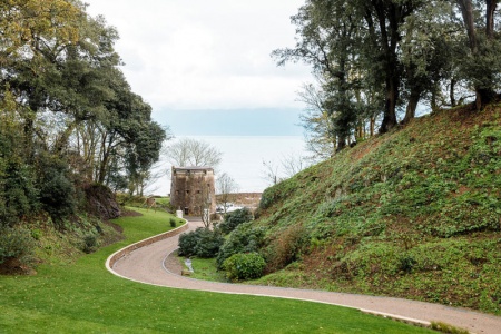 The tower viewed from the drive to the property above known as Cedar Valley