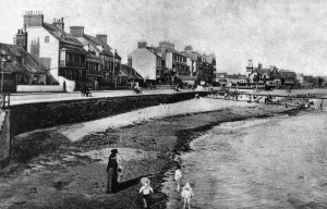 A family on the beach in the 19th century