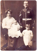 The Cornish family: Albert William, Jessie, nee Manning, and their children Hilda, Sidney and Edna. The family was living in Jersey, where Sidney and Edna were born in 1912 and 1914 respectively. Albert (1877-1914) and Jessie were from Devon, and Albert was a Company Quartermaster Sergeant with the Devonshire Regiment when he was killed in action in the early days of the Great War in September 1914
