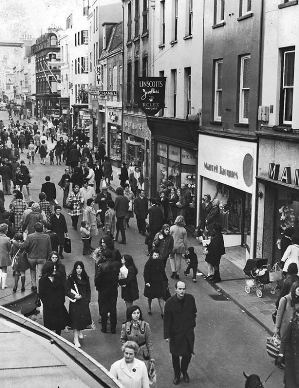 1971, shortly after the street was closed to traffic. Marcel Jacques is No 17, with the lower odd-numbered properties stretching beyond. It used to be possible to walk through from King Street to the Royal Square in a covered walkway between Nos 15 (Linscott's in this photograph) and 17, but that has since disappeared with redevelopment