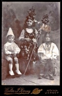 Another photograph of the Falla siblings in fancy dress for a family event hosted by their parents in 1910