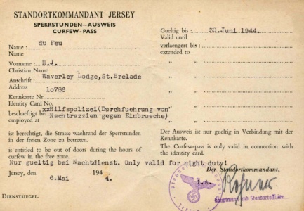 A curfew pass issued to Herbert John du Feu during the Occupation as a member of the St Brelade Honorary Police [1]