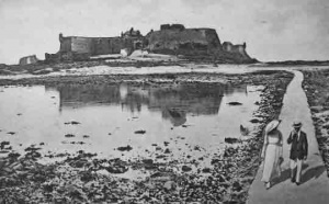 The causeway connects the castle to the St Helier shore at low tide
