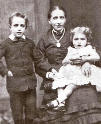 This picture supposedly shows Louisa Grandin, nee Allix, wife of John Elias Grandin, with son Richard John, born in 1882 and daughter Violet, born in 1885. However, Richard John was born in 1892 and did not have any younger sister, so the identity of both children must be open to speculation