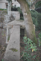 German machine gun position a few metres from the front gate. It had a steel door, removed after the war and replaced by concrete
