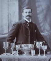 An unknown sharpshooter with his trophies in the 1890s
