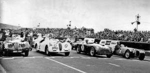 The front of the grid in 1952 - two Jaguar XK120s on the left, driven by Bill Dobson and Jack Hemsworth, then Reg Parnell's Aston Martin DB3, with Oscar Moore's HWM-Jaguar on the right