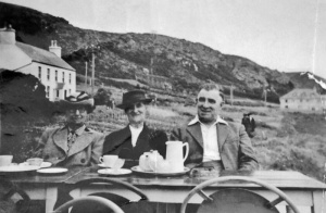 Afternoon tea at l'Etacq for Louisa Le Roux, nee Vibert, Ada Mary Bisson, nee Vibert, and Charles Le Roux, Louisa's husband