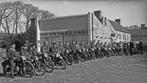 Evening Post photograph of competitors in a 1956 trial, lined up in the Devil's Hole car park