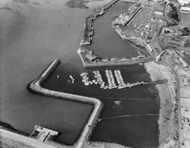 The retaining walls completed and marina pontoons installed