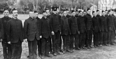A line up of the latest recruits who have arrived from the UK in December 1914 for training with the South Staffordshire Regiment in Jersey: They appear to be parading on People’s Park, which was opposite regimental accommodation in the Grand Hotel. This had been taken over by the army in September 1914 to cope with a rapidly expanding number of men being trained by the regiment.