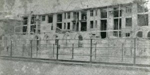 A sadly very poor quality photograph of the original building under construction ...