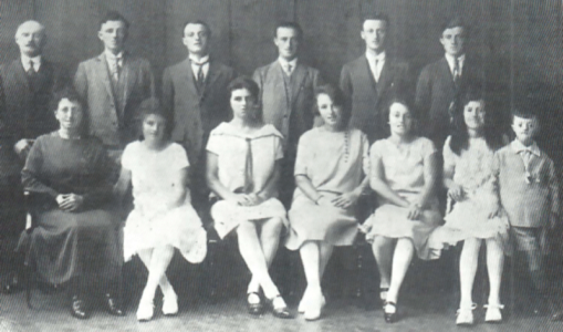 And a later picture showing parents Peter and Maria Lamy and including their eleventh child George (1914- ). Marie and Adelina, in the centre of the front row, who were taller than their elder brothers in the earlier photograph, can be seen to have grown into tall young women. Family tree: Descendants of Pierre Lamy