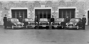 New cars and their drivers on parade with Chief Officer Henry Le Brocq on the right