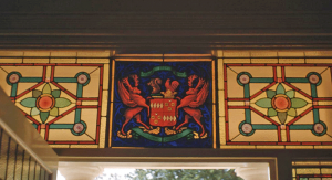 Stained glass window over the front door pictured in 1957
