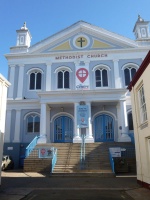 It was not previously possible to pass down the side of Wesley Grove Methodist Church (now 'The Centre') into Halkett Place, but now it is, and we can turn to look back on an imposing building from the top of whose steps one can enjoy an uniterrupted view for some 500 metres to the other end of Halkett Place. This grand vista was made possible in the late 19th century by road widening in several places, and what were previously Grove Place at this end, and Morier Lane at the other, were both renamed as part of a renumbered Halkett Place