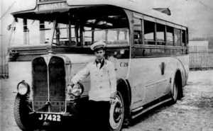 JMT coach with its driver; in service 1939-50
