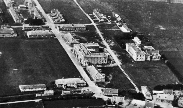 St Peter's Barracks was one of the largest military establishments in Jersey, and continued in use into the 1930s, even though it was no longer needed to house garrison troops. In 1939 the barracks housed the Royal Army Service Corps' Workshops and Technical School, and hundreds of young soldiers were trained there to use and maintain motor vehicles before war brought an end to these activities. By then the new airport had been built alongside the barracks, and, the Army having no further use for them after the Occupation, they were sold for the value of the land - £5,000 - to the States in 1948 and demolished as more and more space was required beyond the perimeter of the original aerodrome