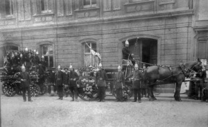 The St Helier and St Brelade fire engines, with their crews, outside the Town Hall on the occasion of an early Battle of Flowers