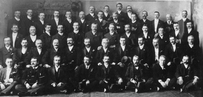 A group of men photographed by Ouless