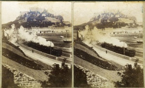 A stereo pair of a train leaving Gorey Harbour