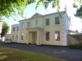 Across the street is the Deanery, home to the Church of England's senior clergyman in Jersey for nearly 200 years. Brett ovbiously failed to look over the wall at this imposing town mansion, set back from the road and, despite synergies of style, entirely different from the nearby terrace houses. Stevens notes that it was built in 1842 for Dean Francois Jeune, and is 'a handsome house of simple design, with a large garden at the rear'. Dean Jeune also initiated the building of the neighbouring St Mark's Church