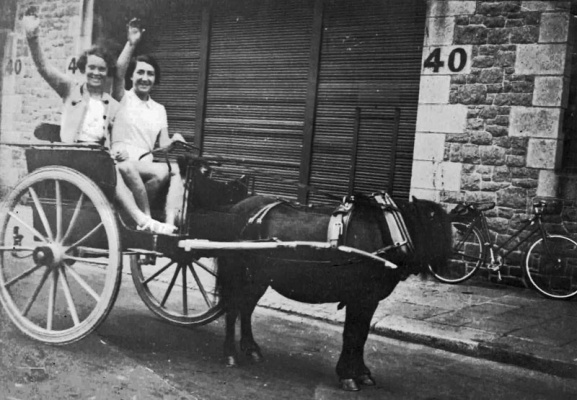 Stella Norrie and Florrie Pitman outside 40 Esplanade, next door to where they worked