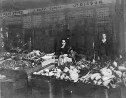 J Bisson's fruit and veg stall - this may be the John Chevalier Bisson who had fruit and veg shops at Charing Cross, run by his wife - he was a tailor