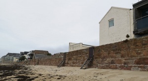 The sea side view of the cottages described above by Sylvia Pinel