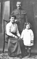 Clarence John Trachy, born in St Mary in 1884, the son of Philippe, son of Jean; and Louisa Mary, nee Horman, (1857- ) daughter of Nicolas, with his wife Florence, nee Le Maistre (1886- ) and unnamed daughter. Clarence served in the Great War as a Rifleman in the King's Royal Rifles